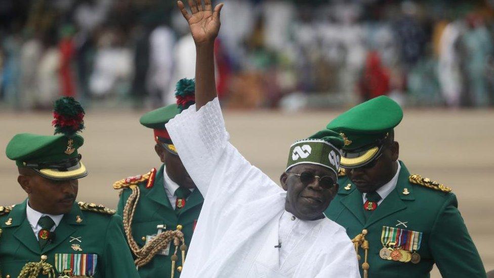 Nigeria president-elect Asiwaju Bola Ahmed Tinubu, (C), waves during the inauguration ceremony in Eagle Square venue in Abuja, Nigeria, 29 May 2023