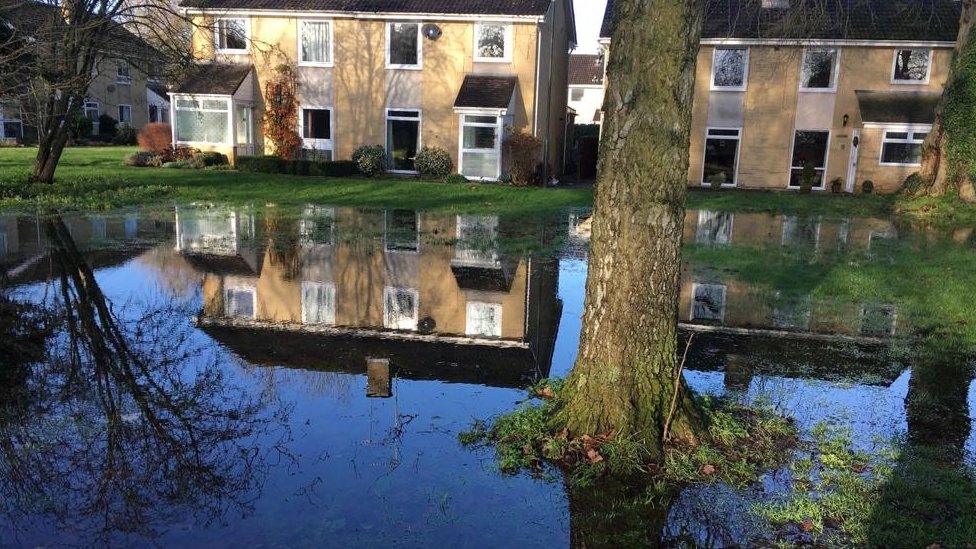 Flooding near homes in Abbey Grounds, Cirencester, caused by the River Churn