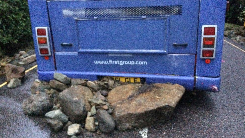 Bus stuck in road