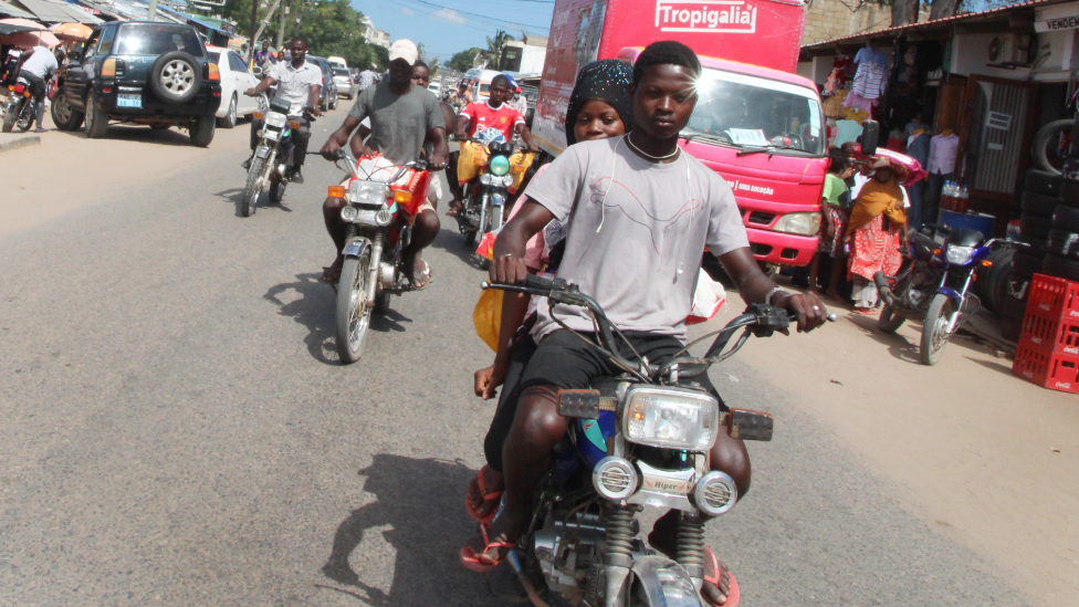 Pelé Bambina on a mota taxi in Pemba, Mozambique - May 2022