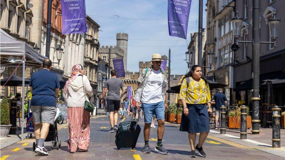 people walking in Cardiff