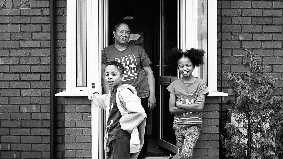 10-year-old Israel with mum, Ebonie and sister, Theodora