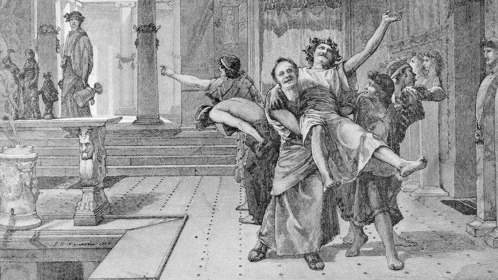 Romans celebrating Saturnalia