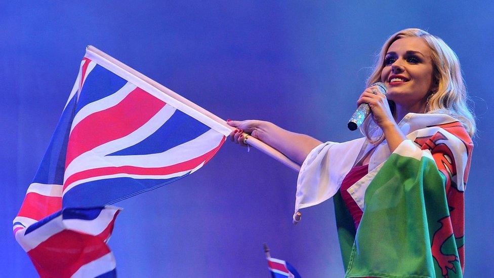 Soprano Katherine Jenkins sings at the Proms wearing Union Jack flag