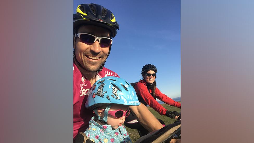 Niall cycling with his family