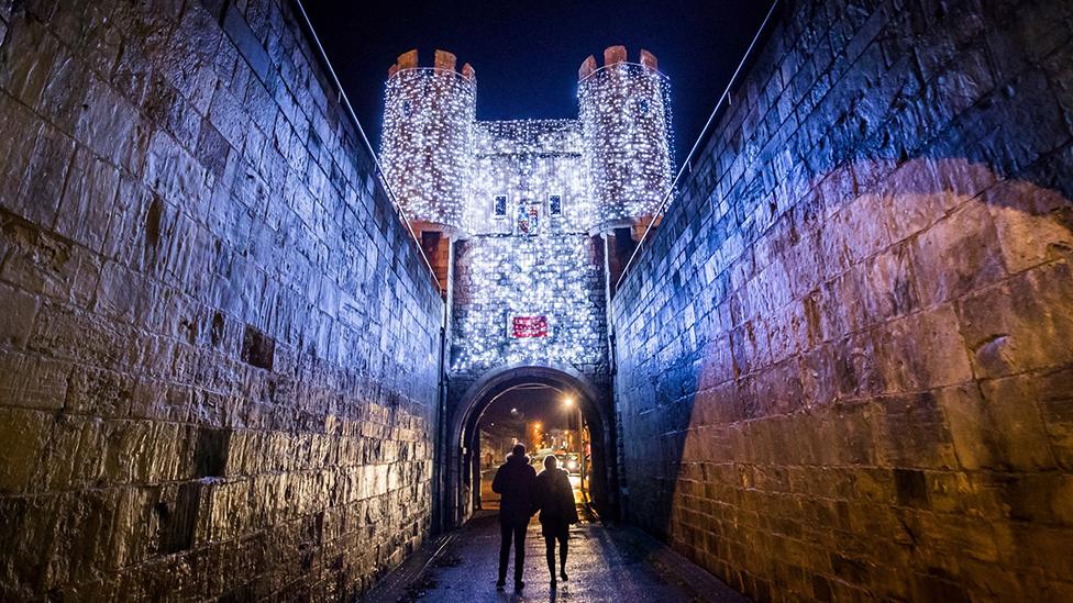 Lights on city wall