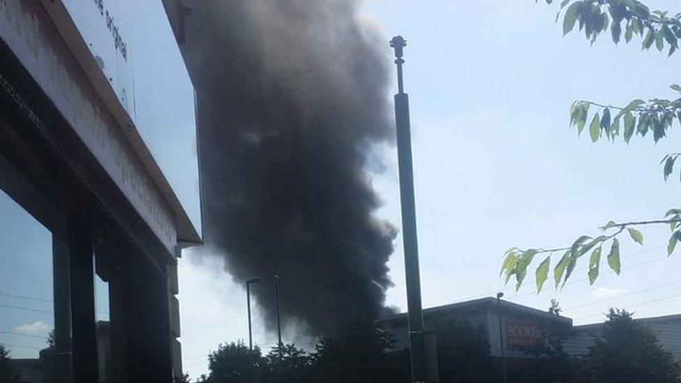 View of smoke plume from the road
