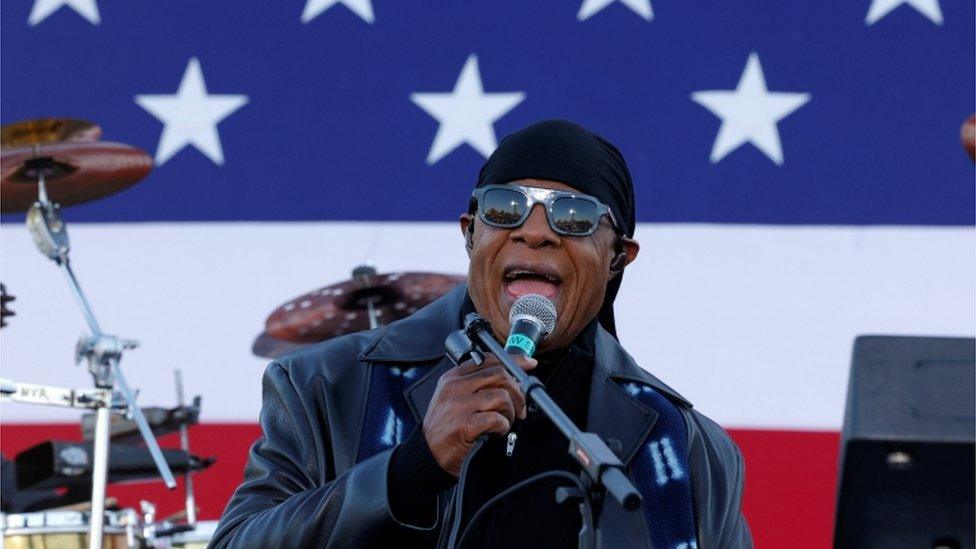 Stevie Wonder performing at an event for Joe Biden