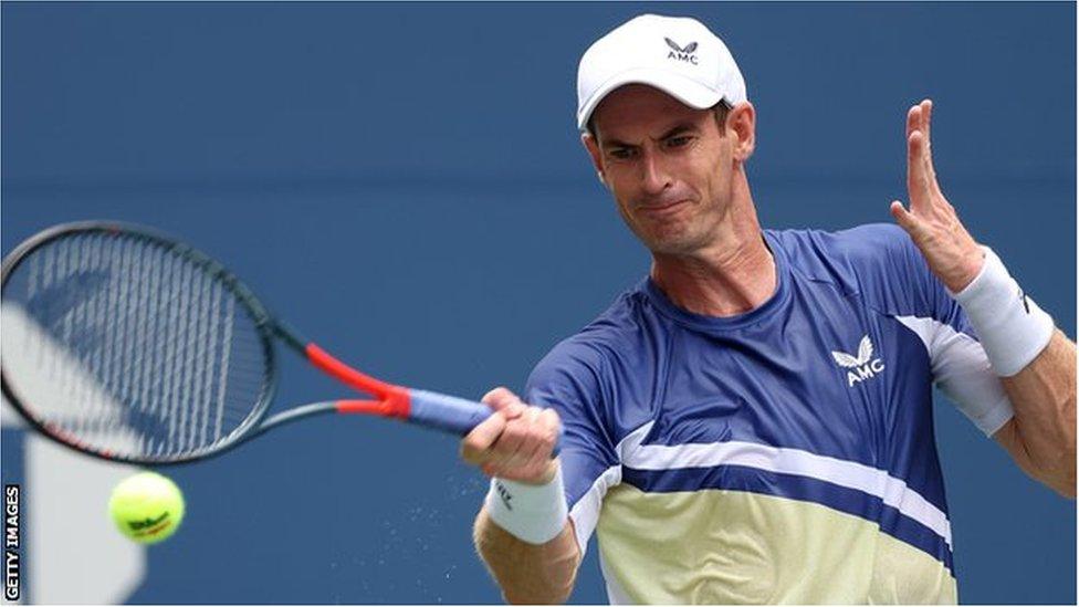 Andy Murray hits a return against Francisco Cerundolo in the 2022 US Open first-round match