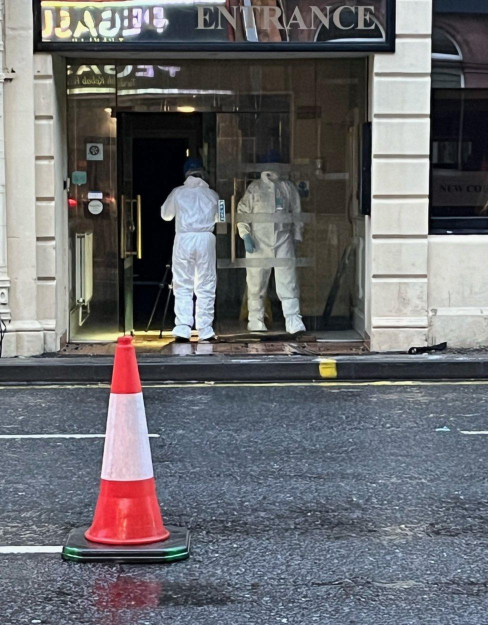 Forensic team at the hotel