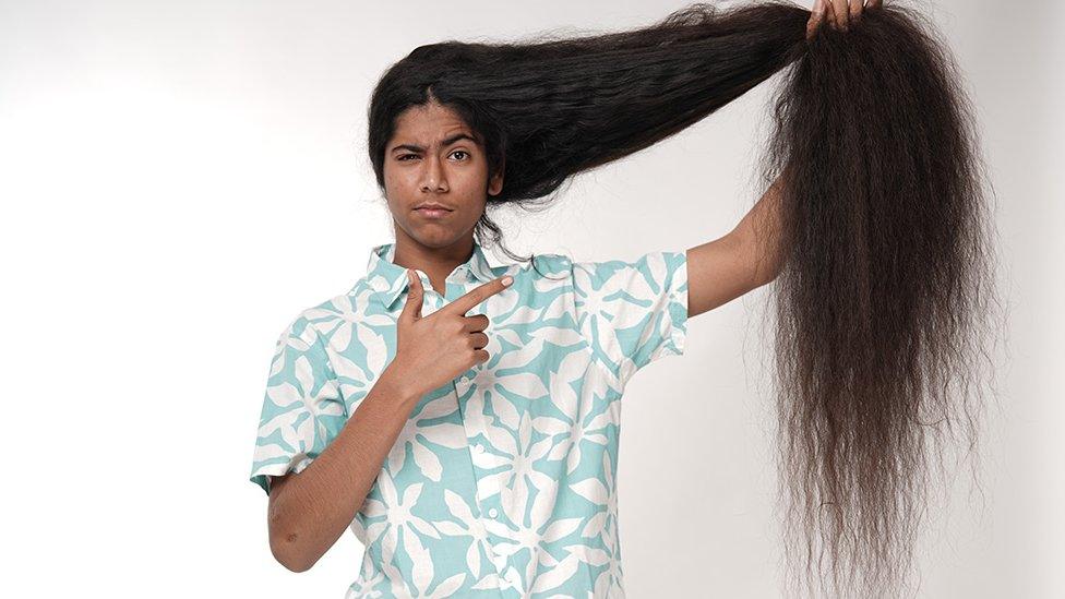 Sidakdeep showing off his long hair