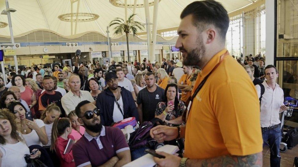 Easyjet employee informs passengers of the changes at Sharm el-Sheikh airport, 6 November 2015