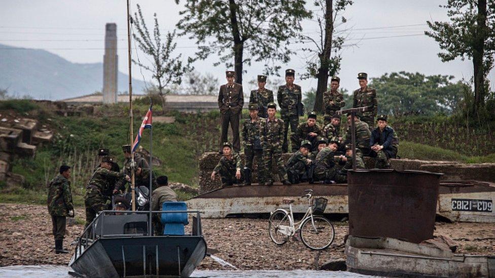 North Korean soldiers patrol the Chinese border