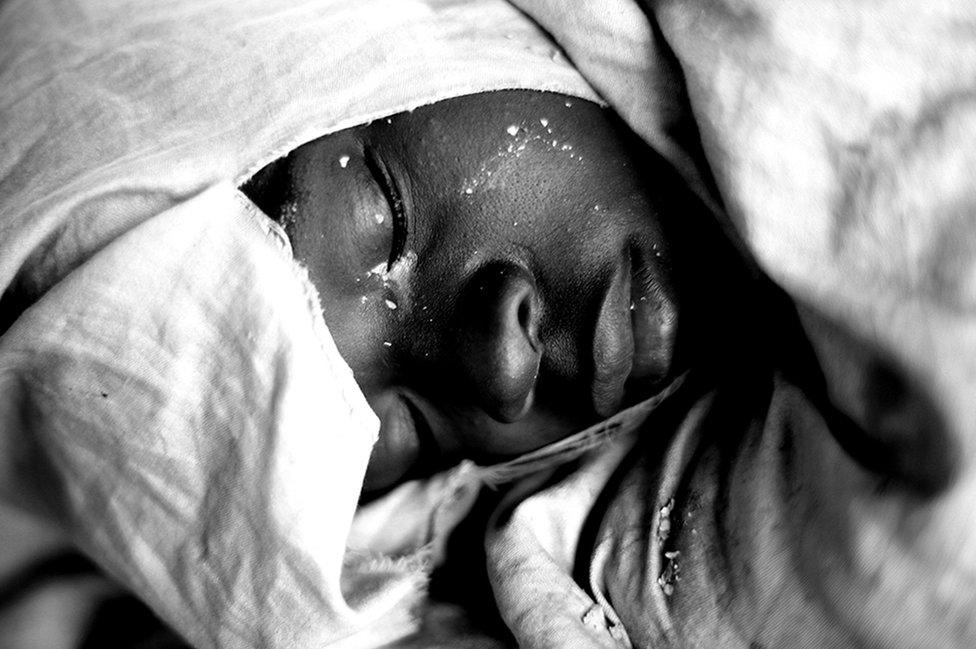 A young man sleeping