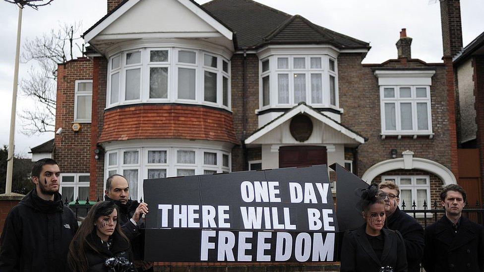 Members of Christian rights group 'Release International' take part in a protest outside the North Korean embassy in west London on January 20, 2012, to demonstrate for personal and religious freedom in North Korea