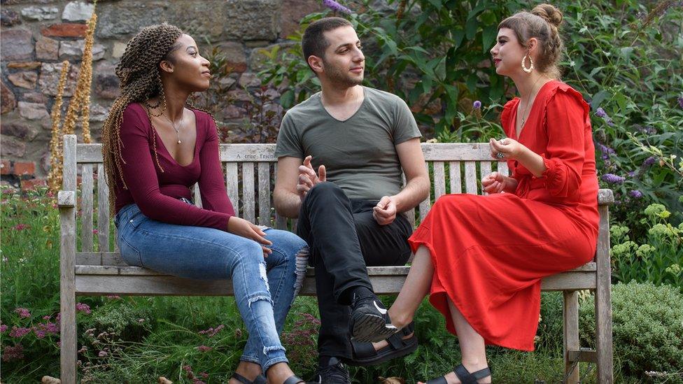 Dr Katie Bales (right) talking to sanctuary students Stella Ogunlade and Sarmad Ozan