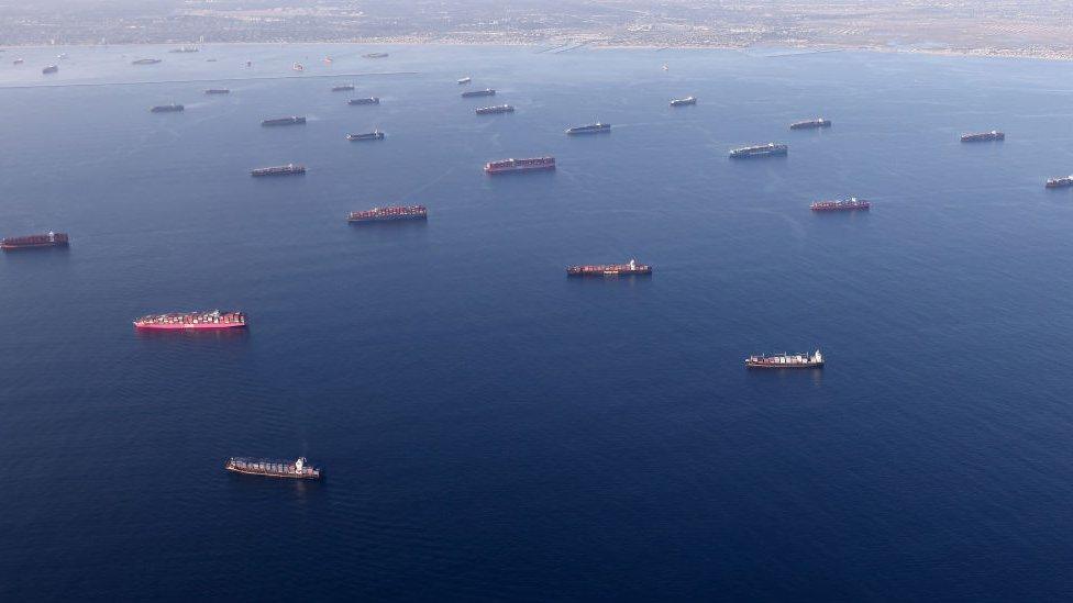 container ships are anchored by the ports of Long Beach and Los Angeles