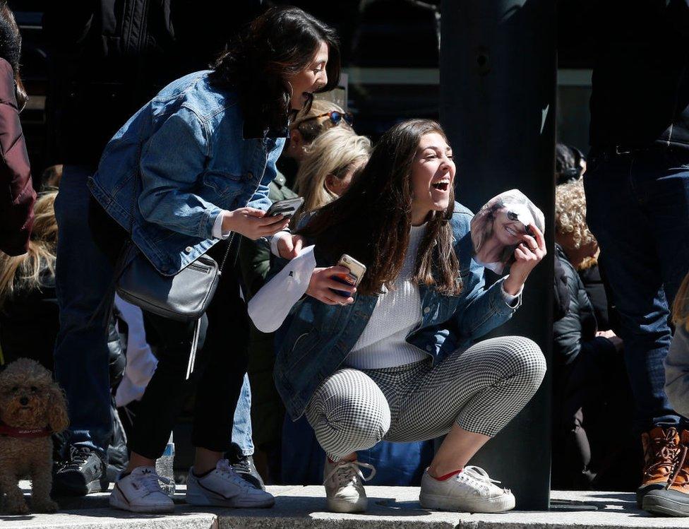 Fans outside the court cheered when Ms Loughlin arrived in a black van