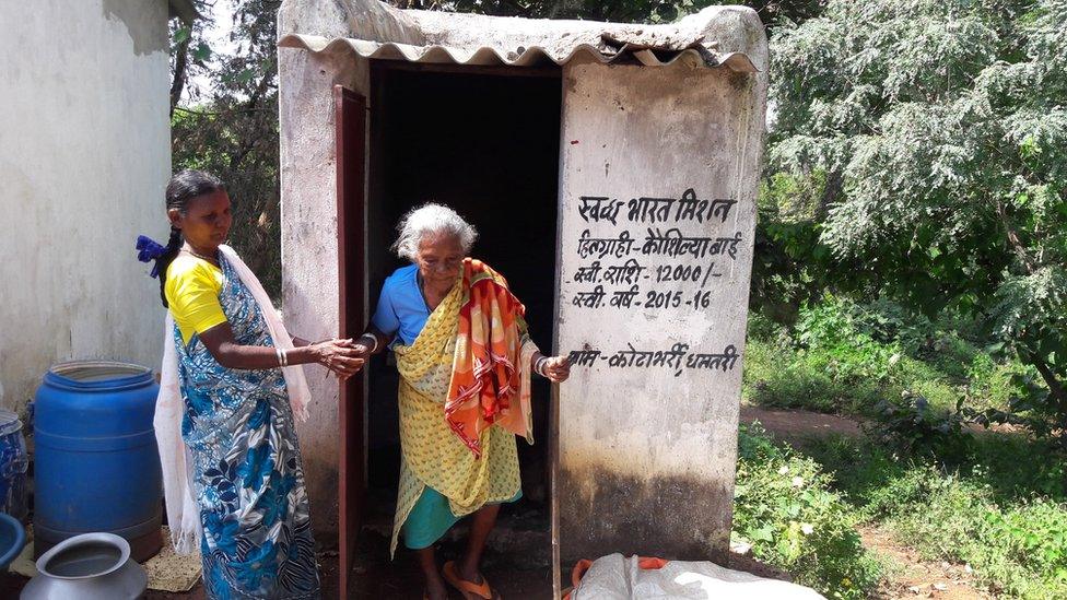 Kunwar Bai Yadav outside the toilet