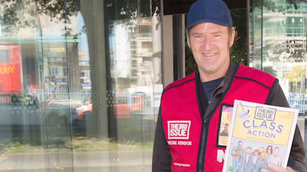 Clive Rowe outside the theatre selling the Big Issue