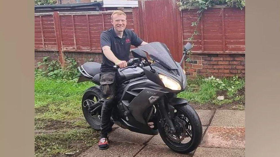 Sam Bagley sitting on his motorbike