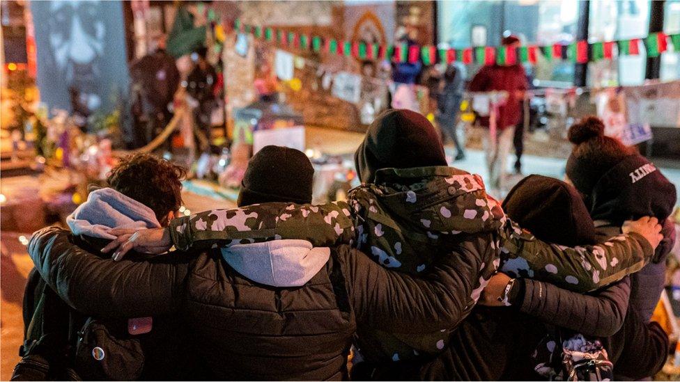 Mourners gather for a vigil for George Floyd following the verdict in the Derek Chauvin trial on April 20, 2021 in Minneapolis, Minnesota.