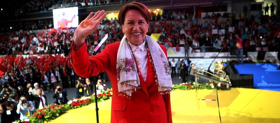 Meral Aksener, leader and presidential candidate of the Turkish opposition 'Good Party' (IYI) greets people during an election campaign meeting in Ankara, on May 30, 2018