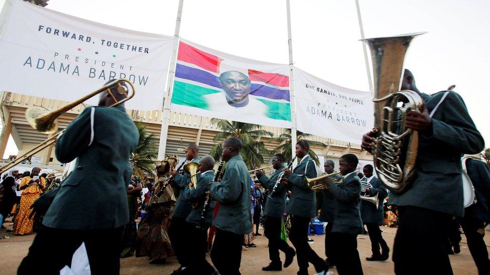 Supporters of Gambian President Adama Barrow arrive for his swearing-in ceremony at Independence Stadium