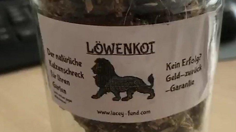 Lion poo in a jar.