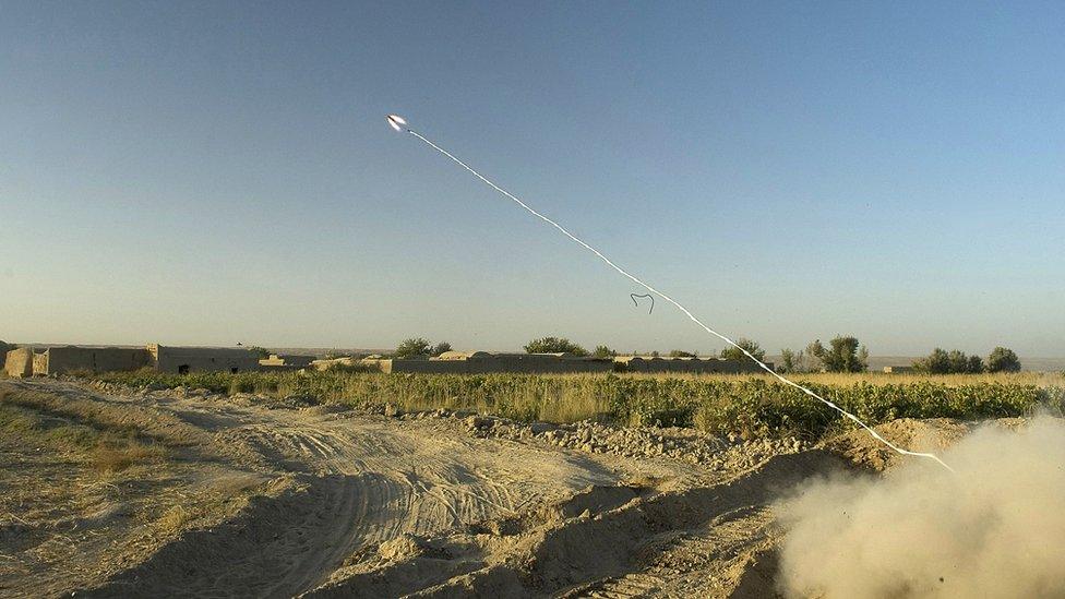 A rocket attached to a string