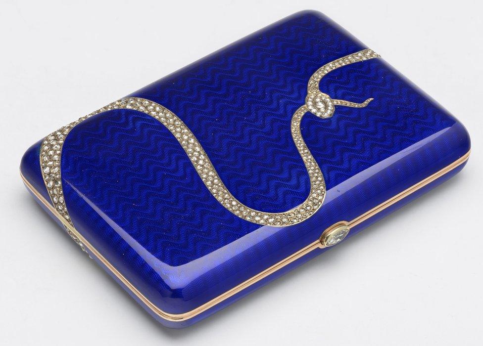 2) Enamel cigarette case which is decorated with diamond-set snake biting its tail given to King Edward VII by Alice Keppel