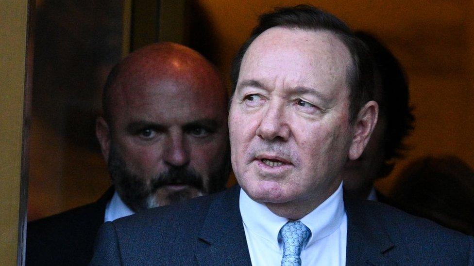 Image shows Kevin Spacey leaving court earlier this month