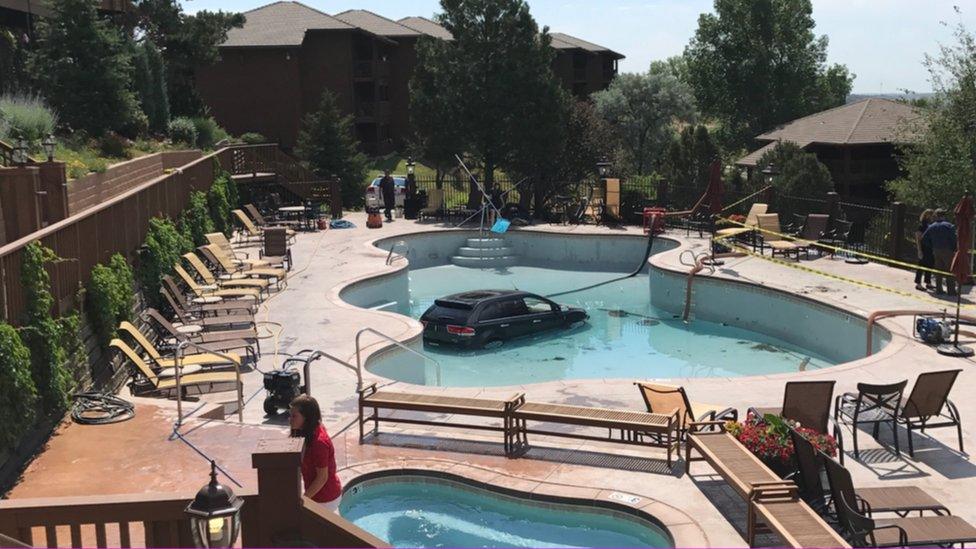 A car sitting in the bottom of an empty swimming pool in Colorado Springs - 3 July 2017