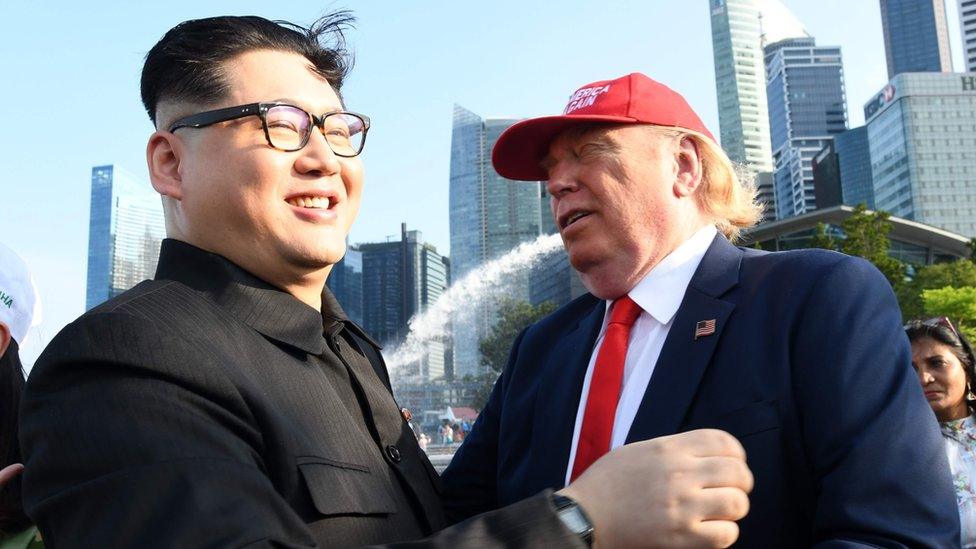 Kim Jong Un impersonator Howard X (L) and Donald Trump impersonator Dennis Alan