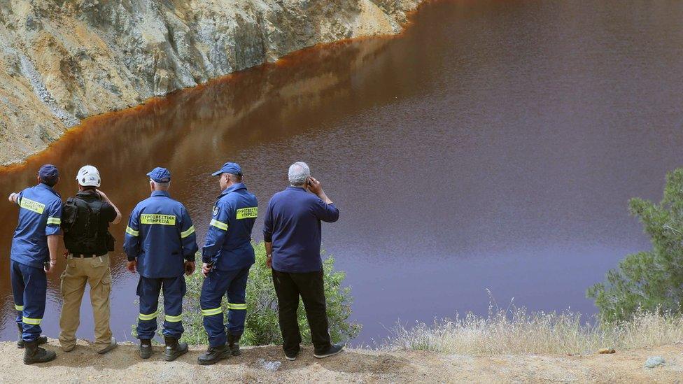 Fire-fighters and investigators are searching the Red Lake in Mitsero using robotic equipment to navigate its toxic water