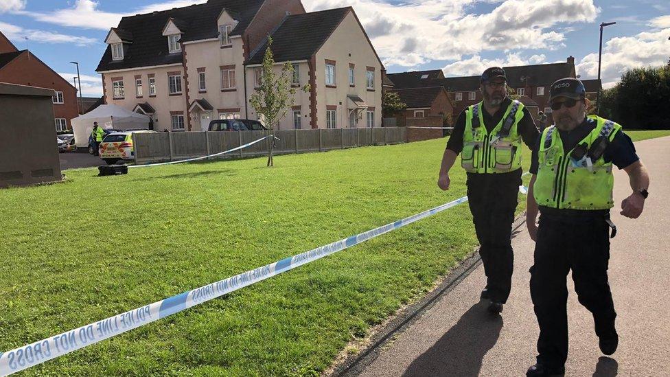 Police at the cordon in Walton Cardiff near Tewkesbury