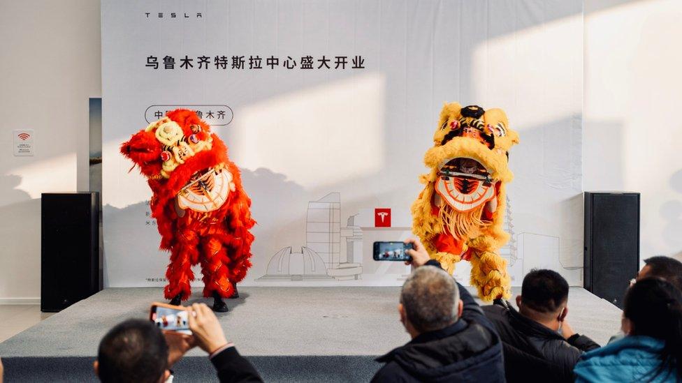 Opening ceremony of Tesla showroom in Xinjiang, China.