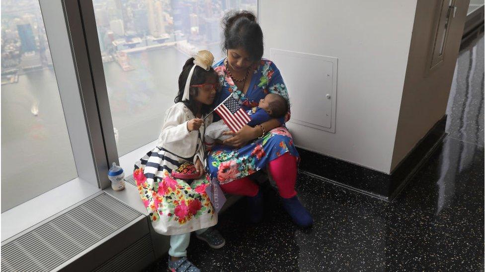 Bangladeshi immigrant Khadijatul Rahman, 29, holds her baby boy Zavyaan, 2 weeks, after becoming a U.S. citizen at a naturalization ceremony held atop the One World Trade Center on August 15, 2017