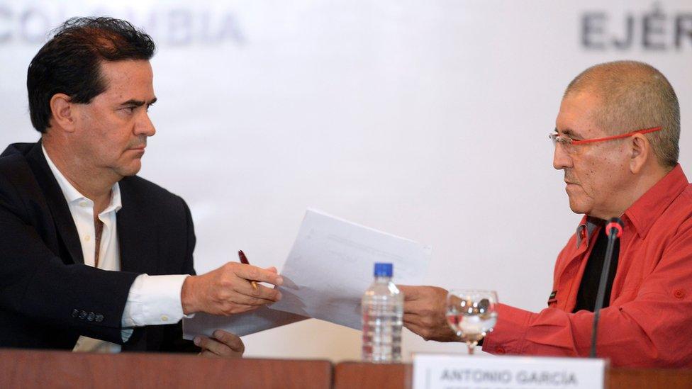 The head negotiators of the Colombian government and the country's ELN left-wing guerrilla, Frank Pearl (left) and Antonio Garcia, are pictured as they begin peace negotiations at the Foreign Ministry in Caracas on March 30, 2016.