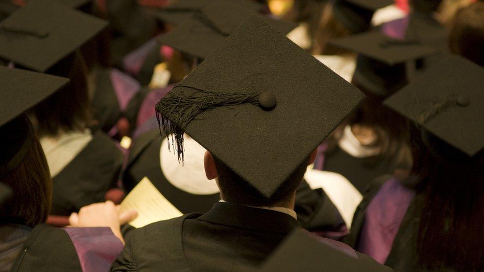 Students at a graduation ceremony