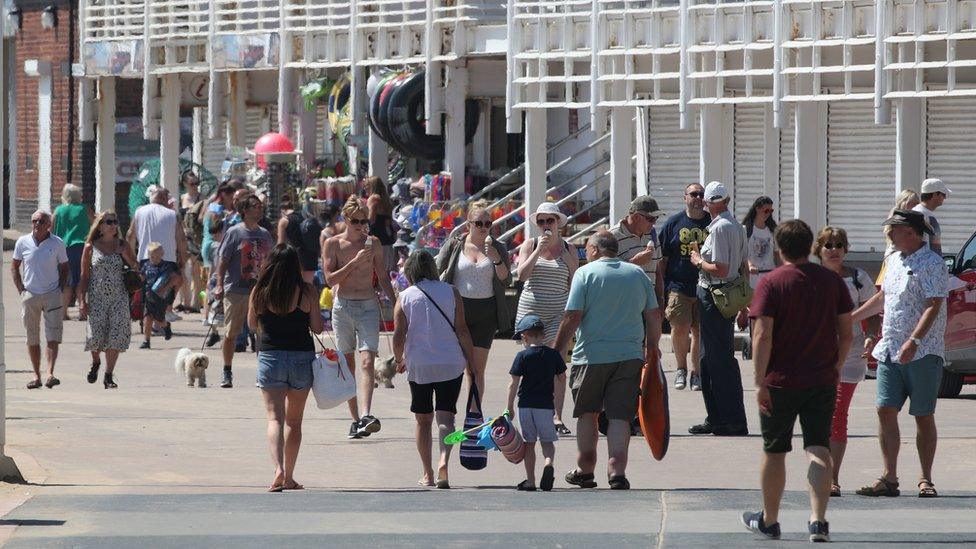 People on the seafront in Bridlington, East Yorkshire