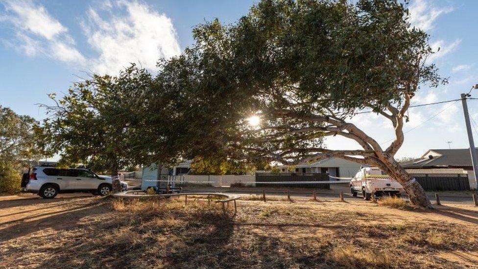 Police vehicles outside the Carnarvon home where Cleo was found