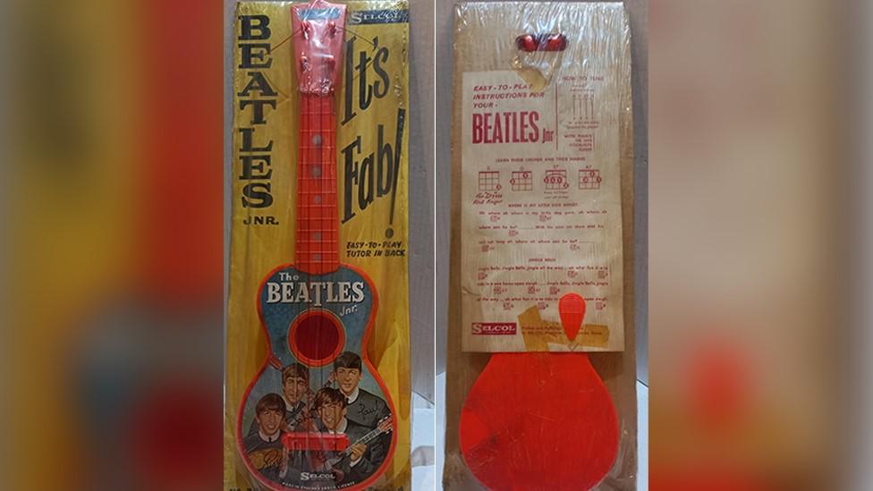 Selcol Jnr Beatles Guitar atached to its original backing card