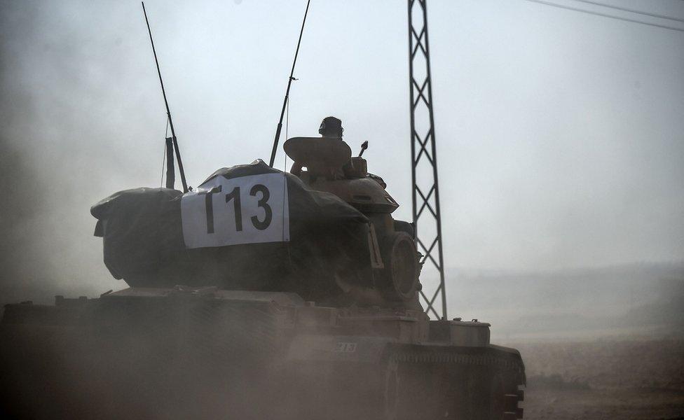 A Turkish tank heads towards the Syrian border, 24 August