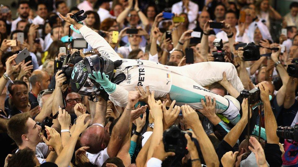 Nico Rosberg goes crowd surfing