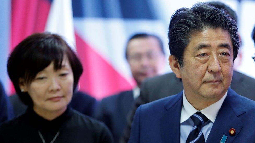 Japan's Prime Minister Shinzo Abe and his wife Akie Abe visit an industrial park in the West Bank's Jericho, 2 May 2018