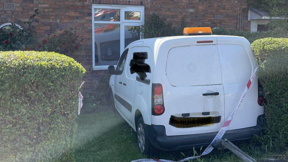 A white van after it crashed into a wall in West Bromwich