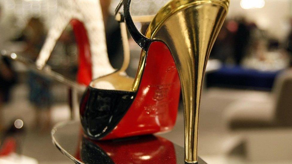 Gold red bottom heels best sale