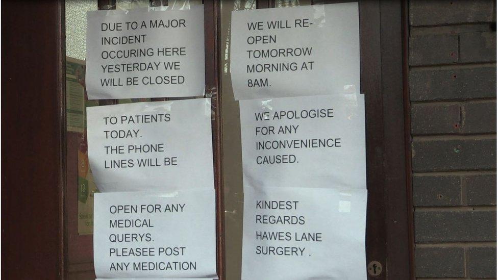 Signs on the surgery's front door