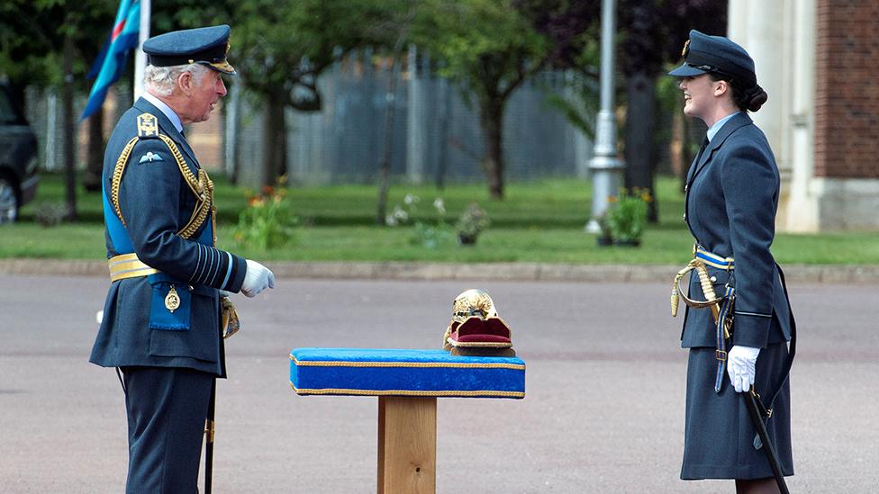 The prince presents an award